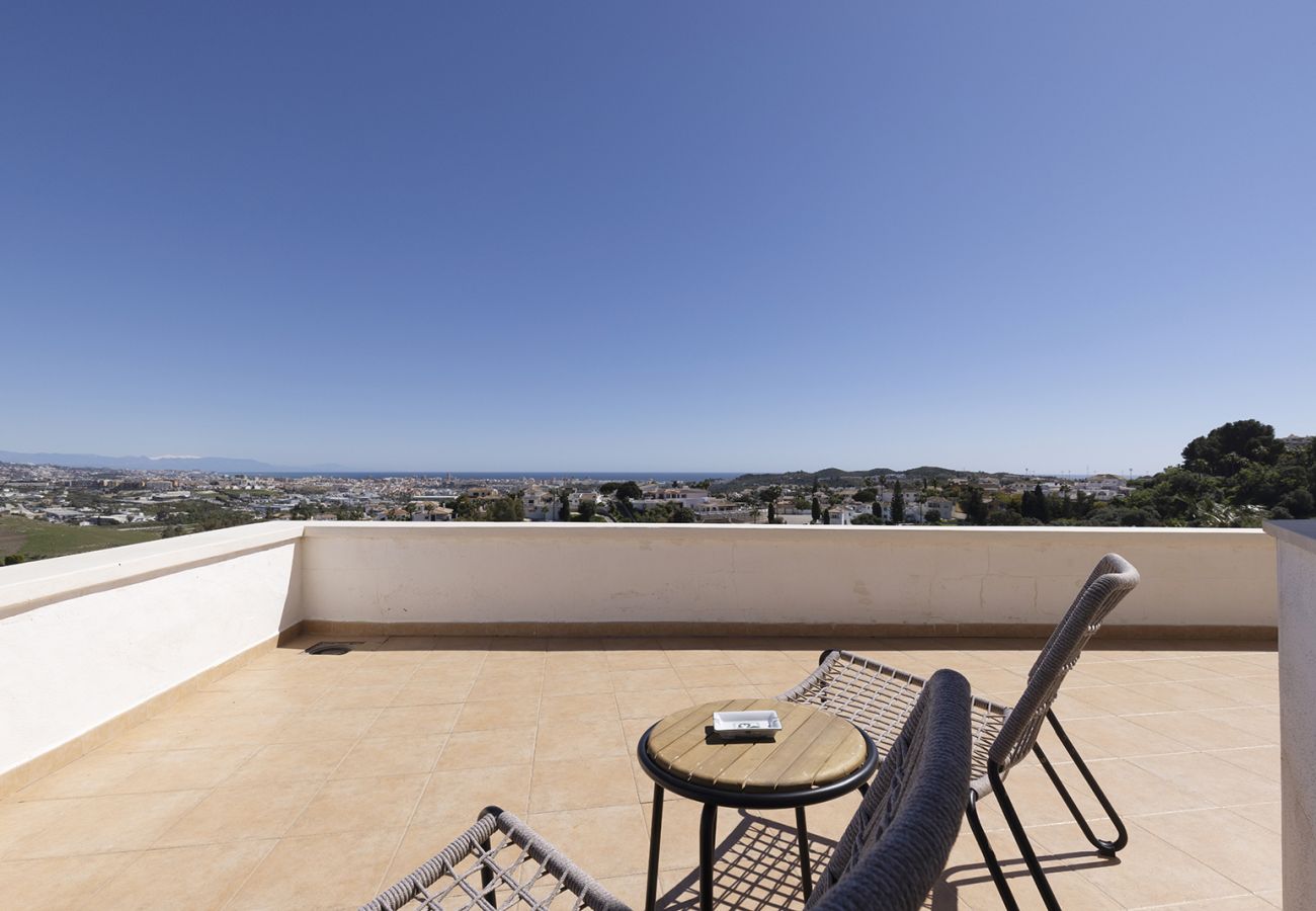 Villa en Mijas Costa - Villa La Rosa con vistas al mar: 5 dormitorios, 4 baños y piscina climatizada
