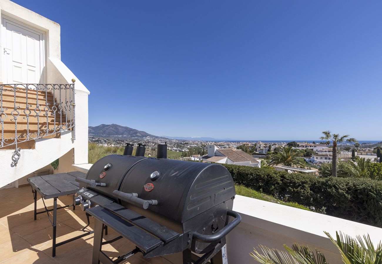 Villa en Mijas Costa - Villa La Rosa con vistas al mar: 5 dormitorios, 4 baños y piscina climatizada