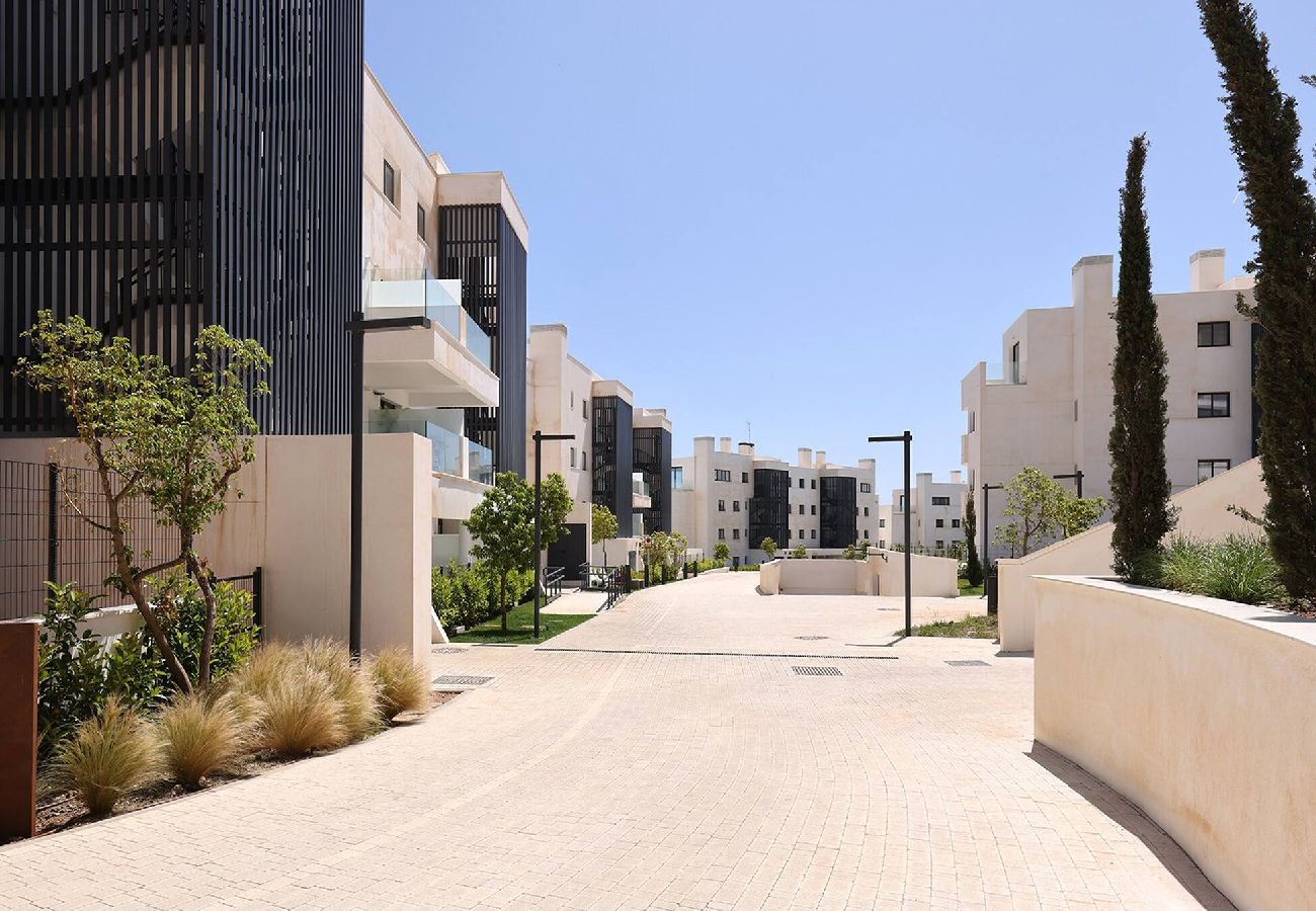 Apartment in Fuengirola - Modern El Higueron West Apt with Private Garden & BBQ