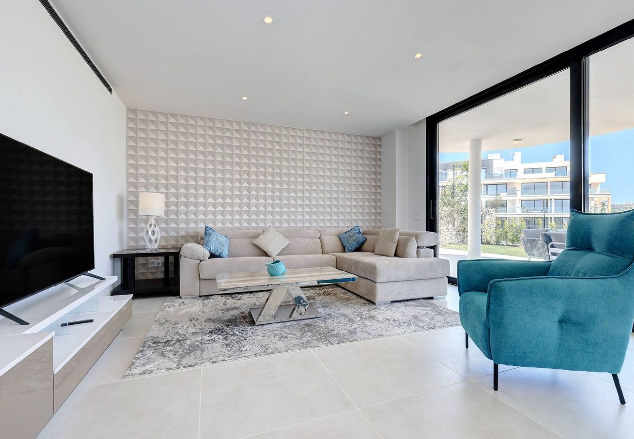 Apartment in Fuengirola - Modern El Higueron West Apt with Private Garden & BBQ