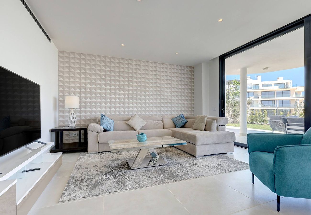 Apartment in Fuengirola - Modern El Higueron West Apt with Private Garden & BBQ