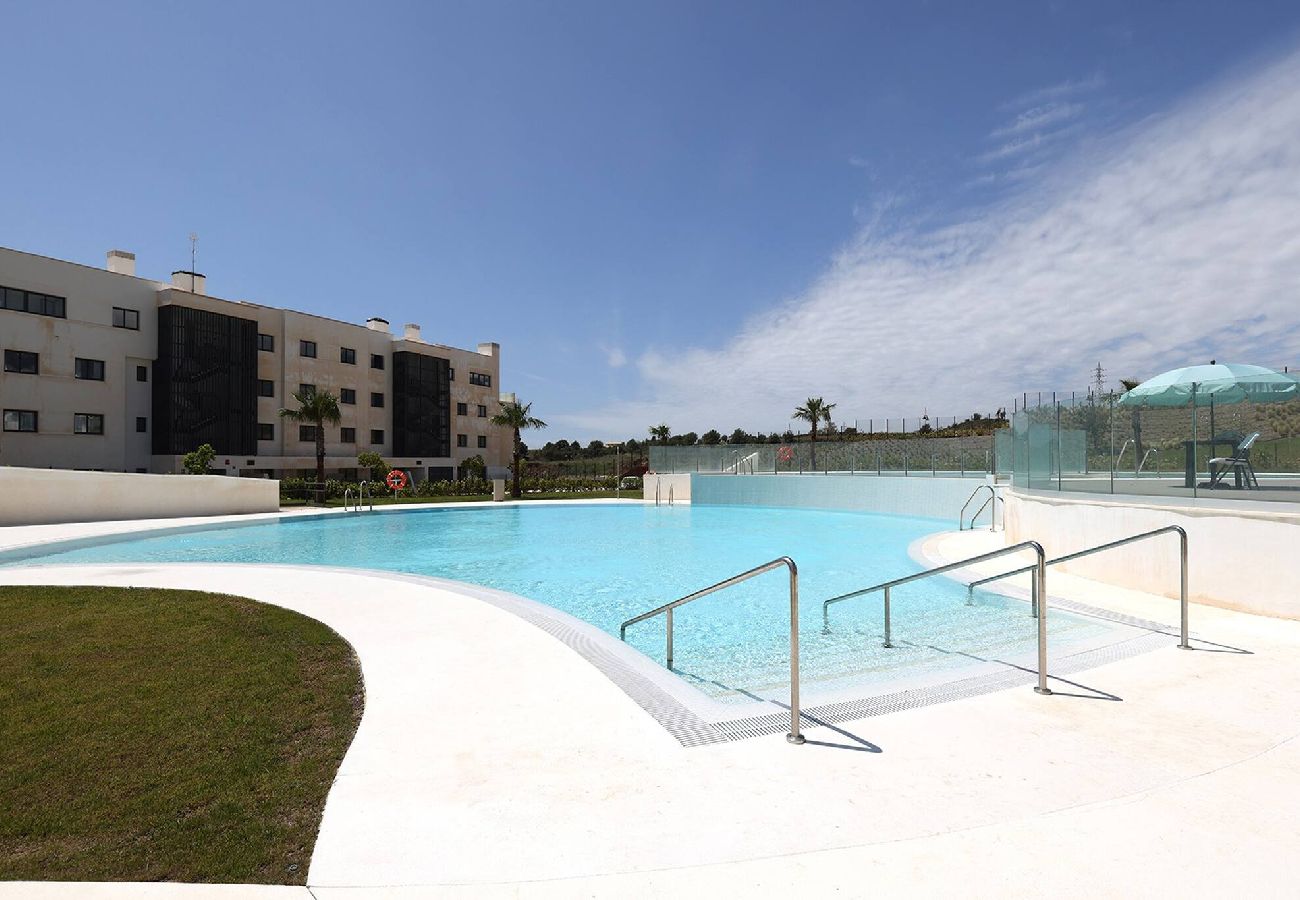 Apartment in Fuengirola - Modern El Higueron West Apt with Private Garden & BBQ