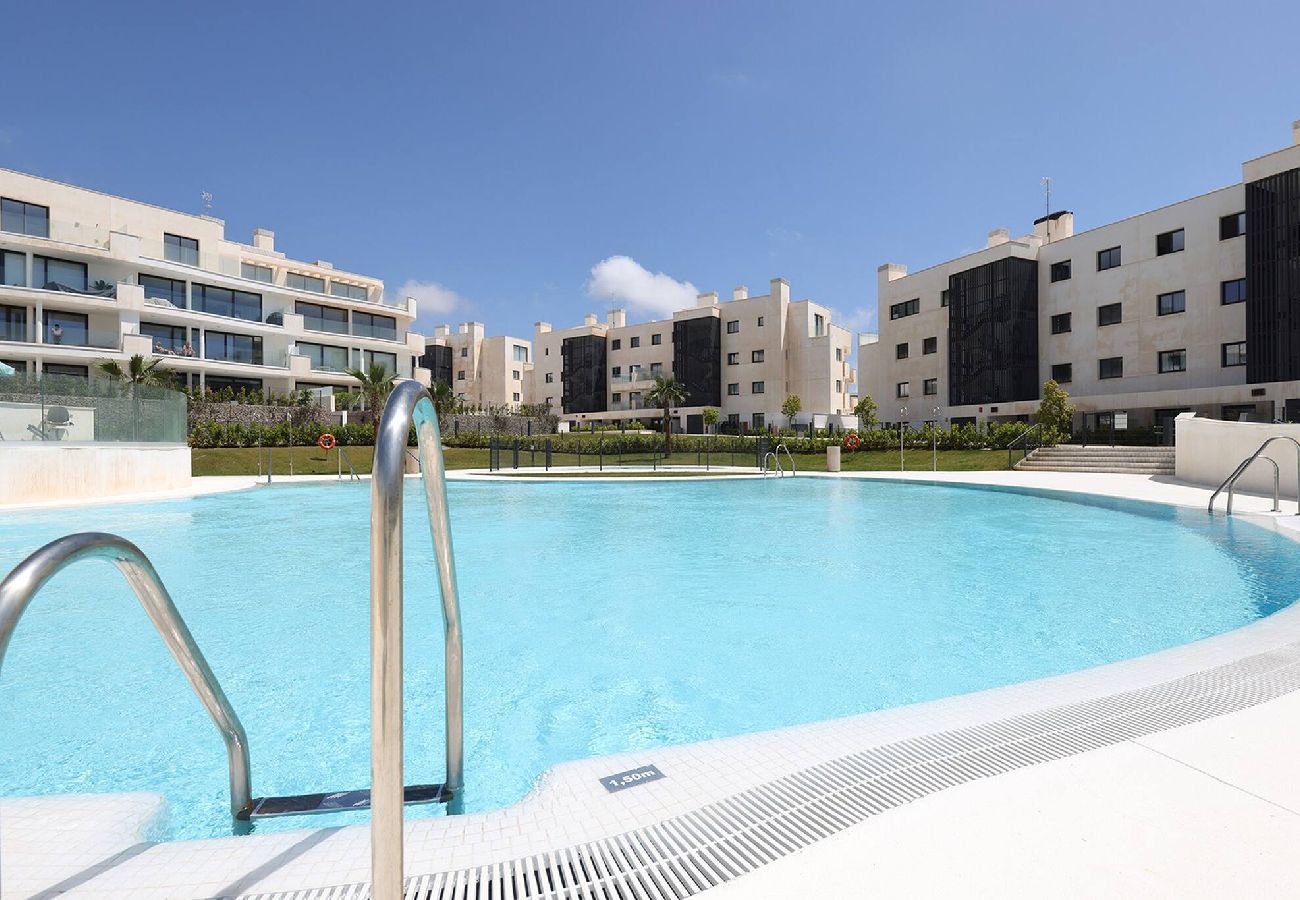 Apartment in Fuengirola - Modern El Higueron West Apt with Private Garden & BBQ