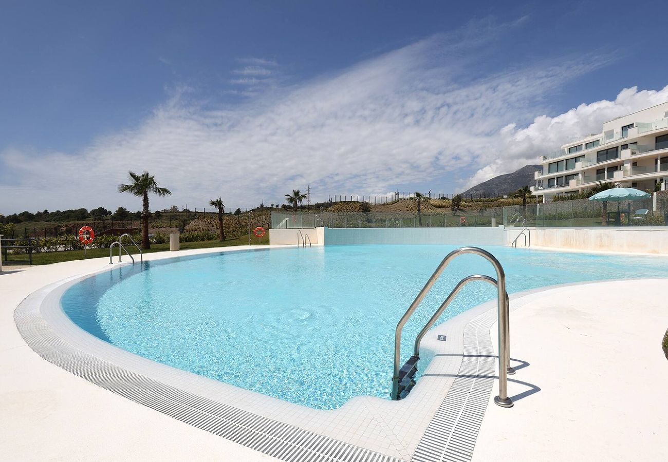 Apartment in Fuengirola - Modern El Higueron West Apt with Private Garden & BBQ