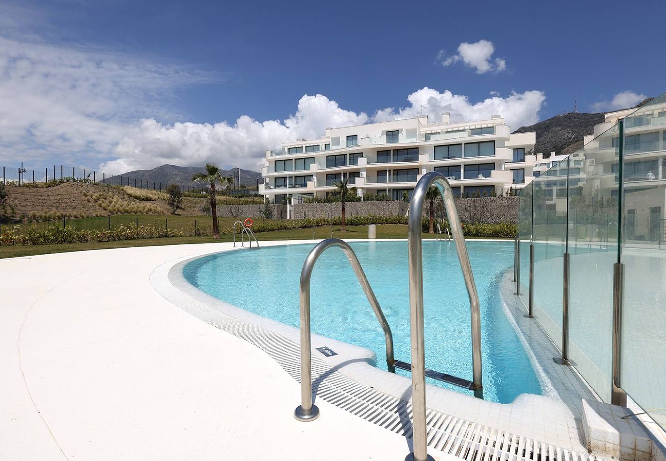 Apartment in Fuengirola - Modern El Higueron West Apt with Private Garden & BBQ