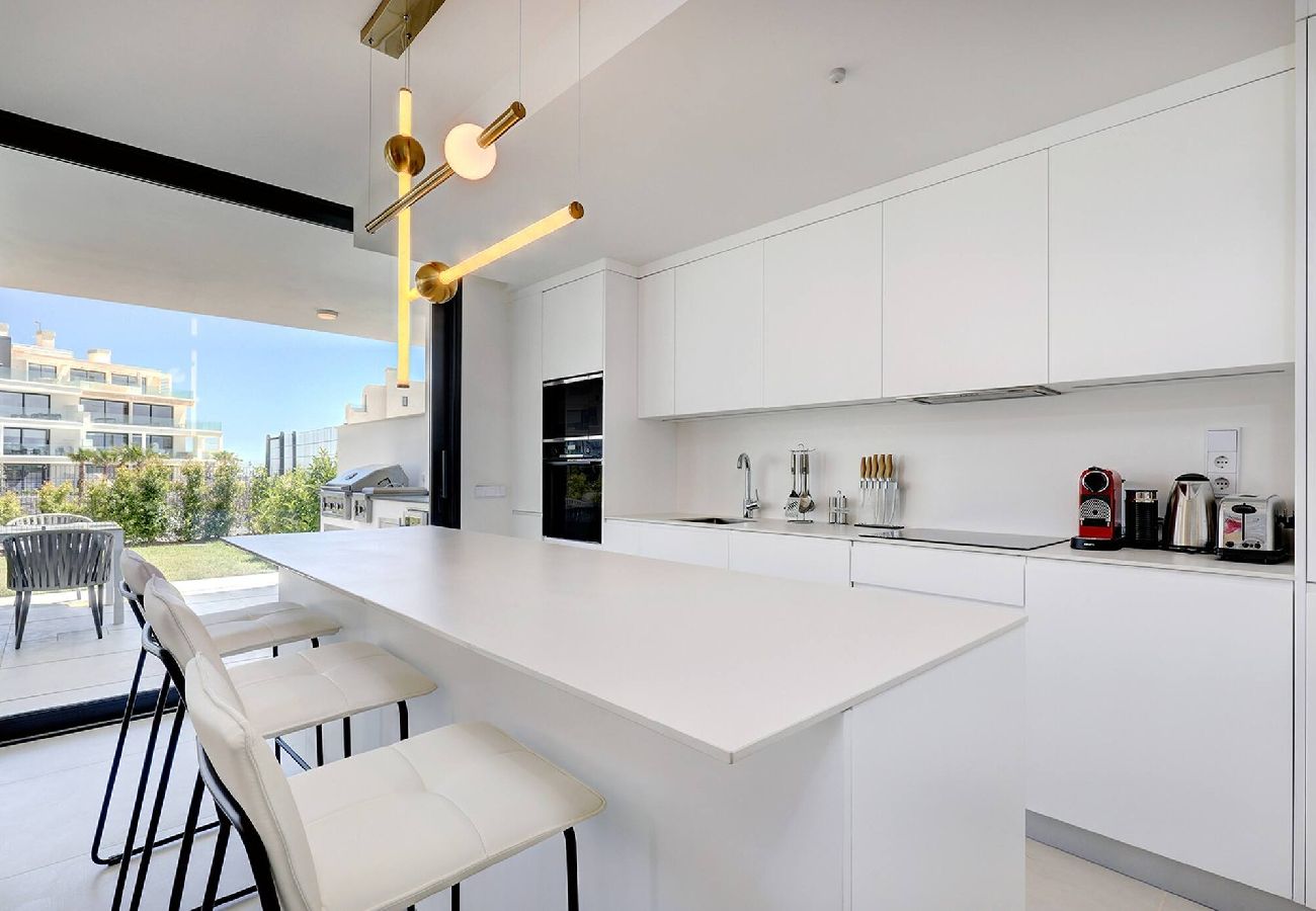 Apartment in Fuengirola - Modern El Higueron West Apt with Private Garden & BBQ