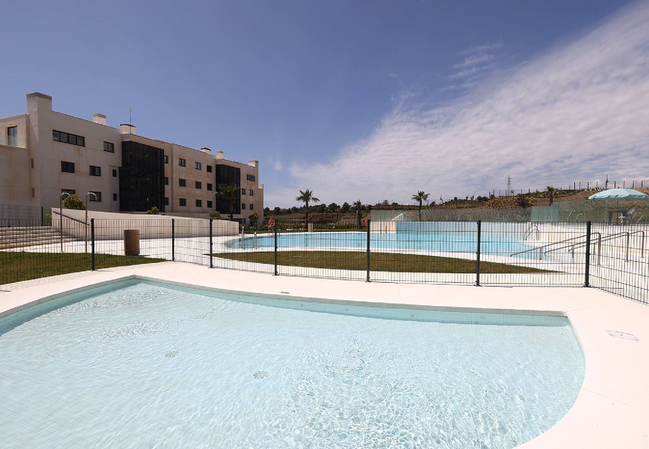 Apartment in Fuengirola - Modern El Higueron West Apt with Private Garden & BBQ