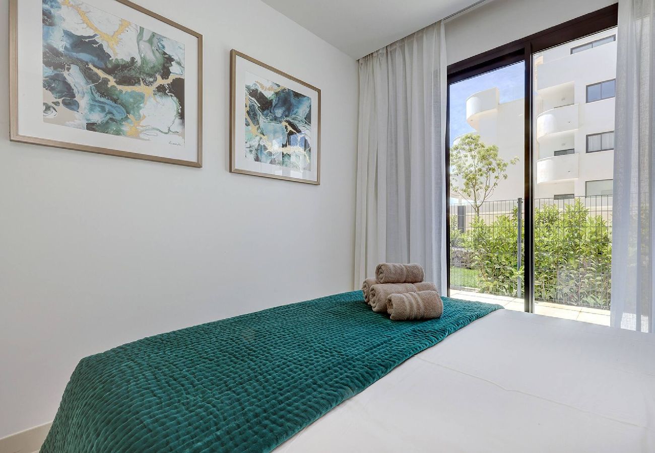 Apartment in Fuengirola - Modern El Higueron West Apt with Private Garden & BBQ