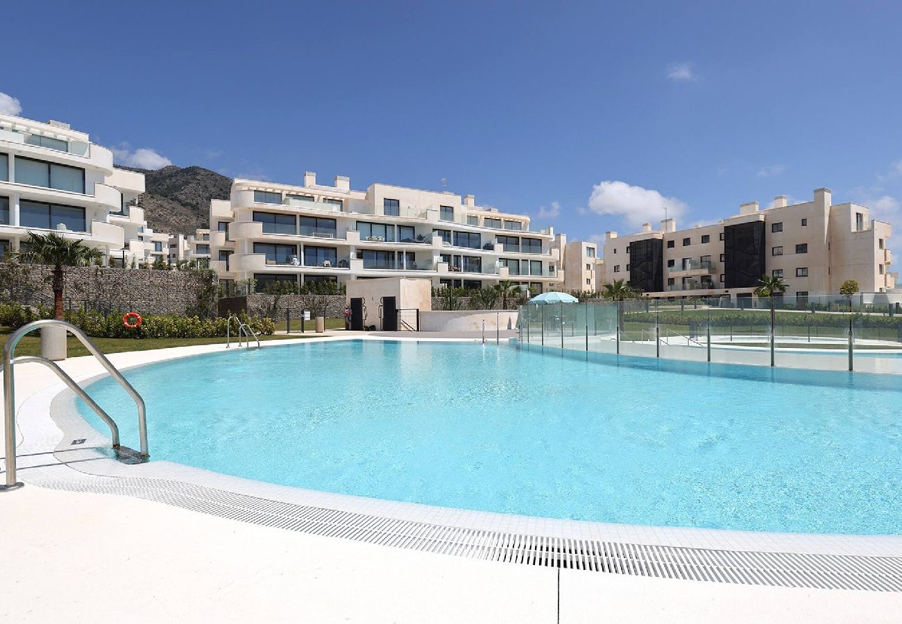 Apartment in Fuengirola - Modern El Higueron West Apt with Private Garden & BBQ