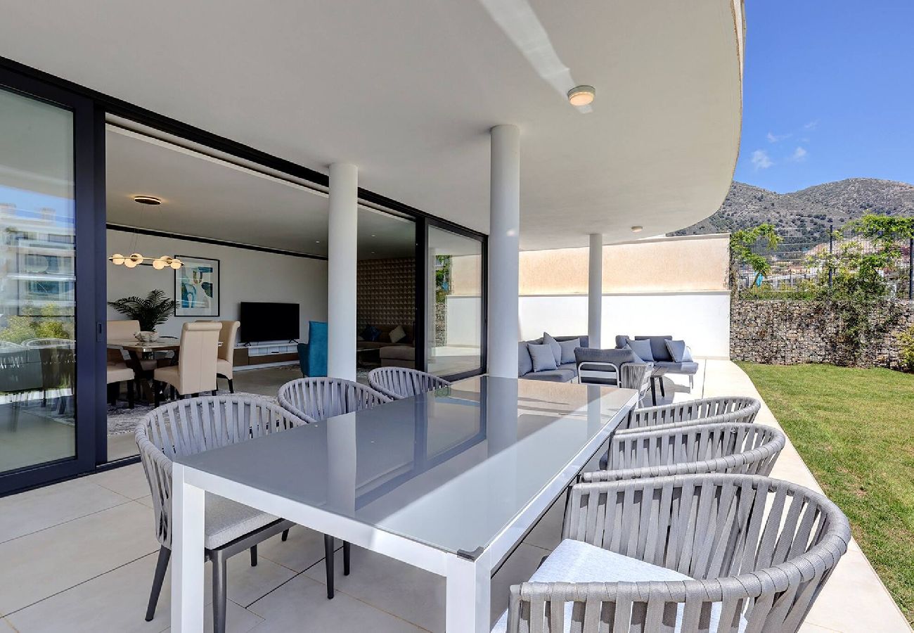 Apartment in Fuengirola - Modern El Higueron West Apt with Private Garden & BBQ