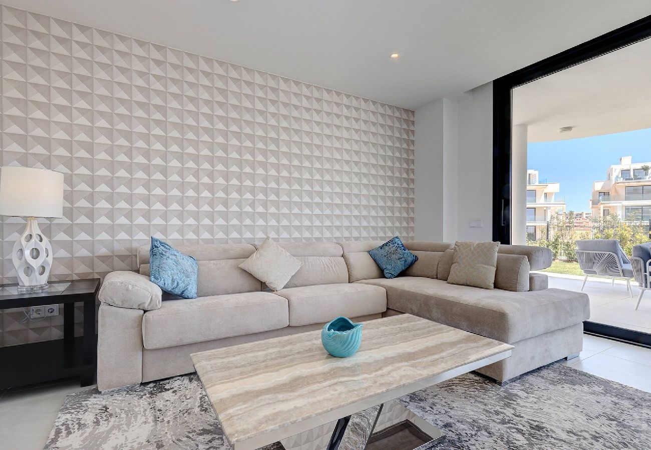 Apartment in Fuengirola - Modern El Higueron West Apt with Private Garden & BBQ