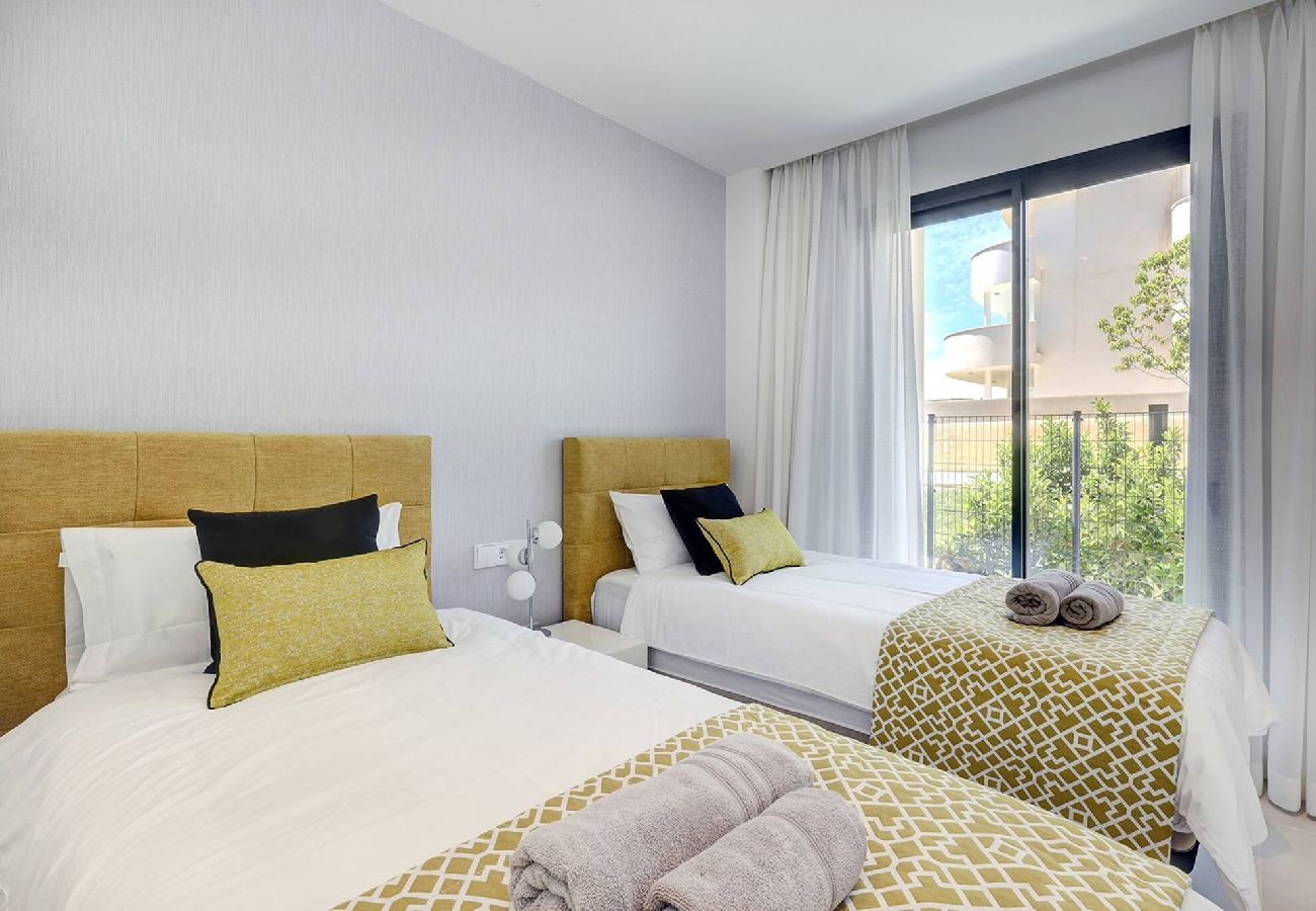 Apartment in Fuengirola - Modern El Higueron West Apt with Private Garden & BBQ