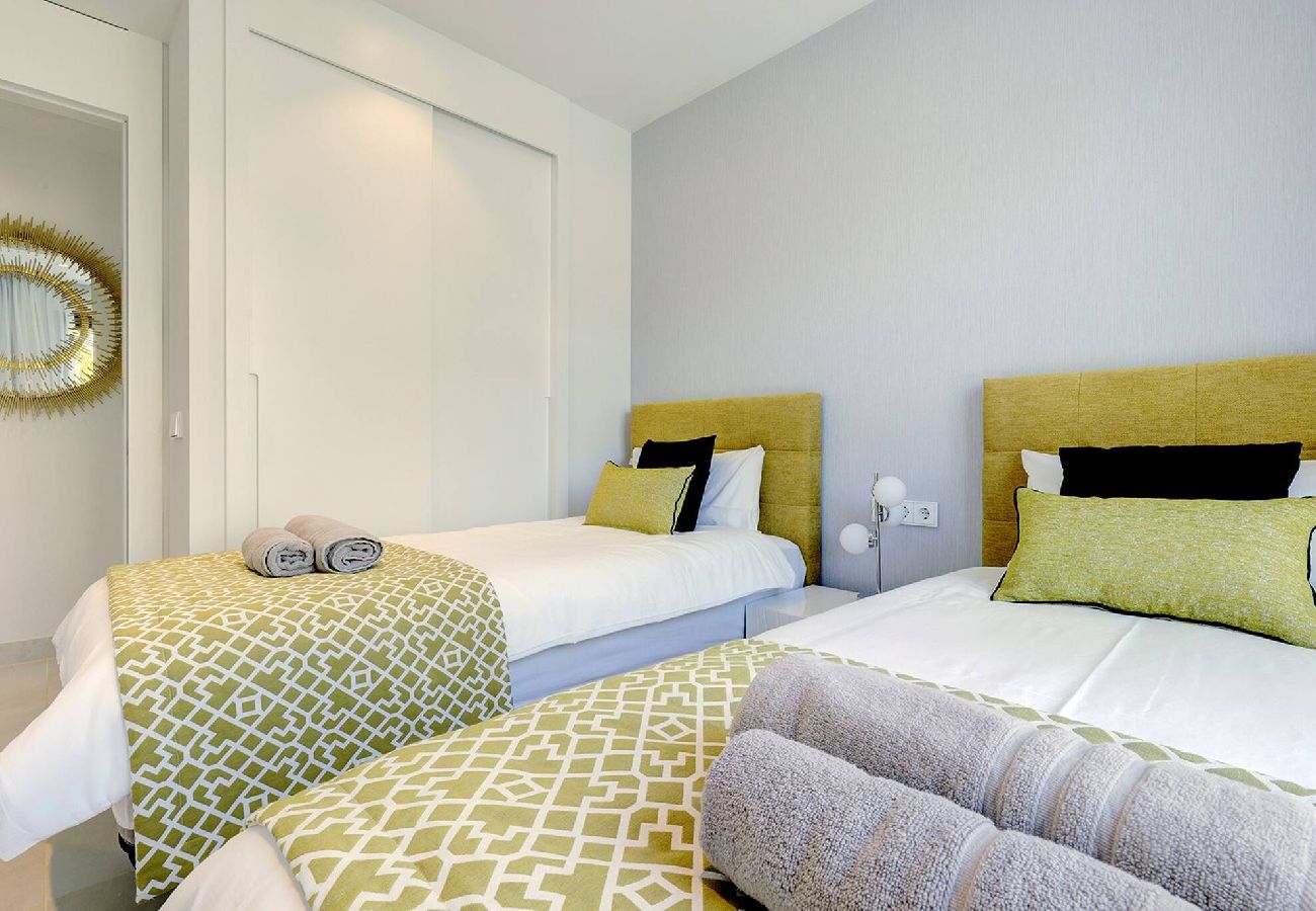 Apartment in Fuengirola - Modern El Higueron West Apt with Private Garden & BBQ