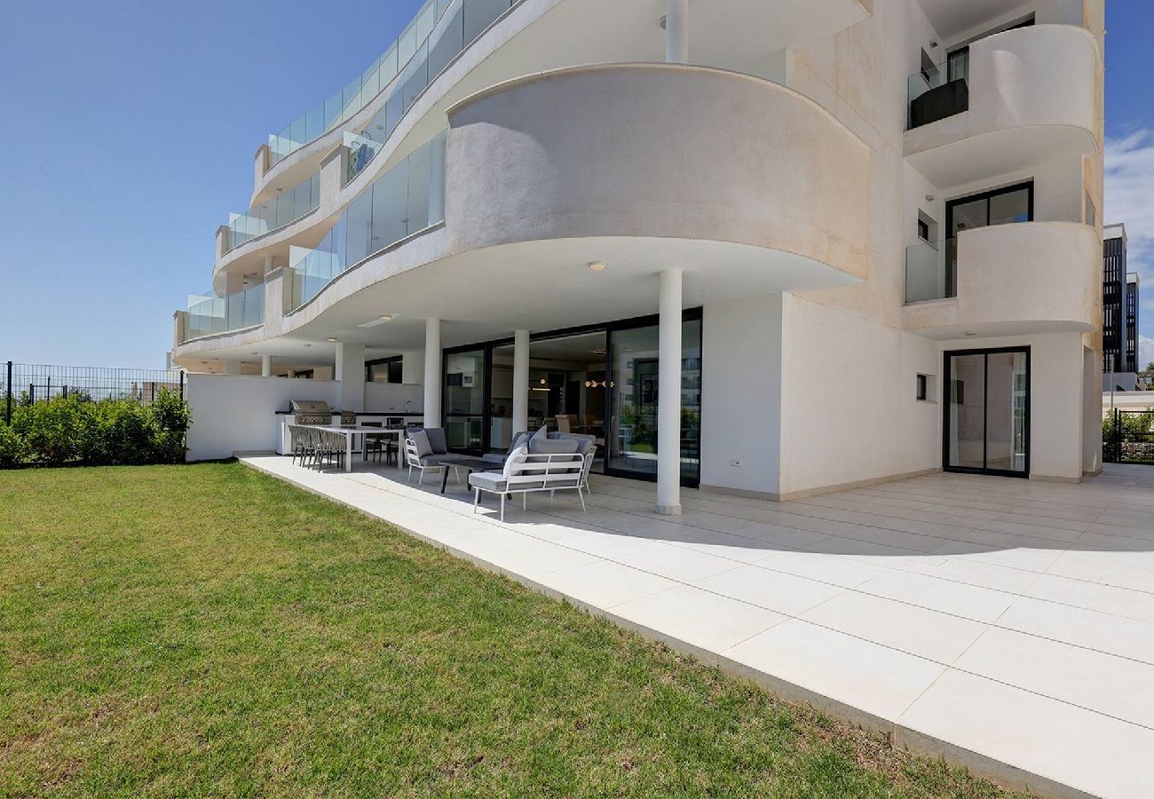 Apartment in Fuengirola - Modern El Higueron West Apt with Private Garden & BBQ